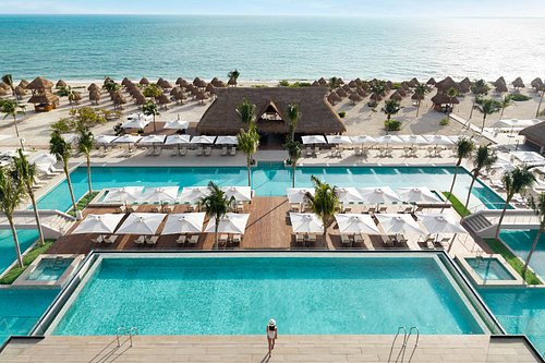 Excellence Playa Mujeres luxury adults-only all-inclusive resort with beachfront pools, elegant suites, and world-class dining near Cancun.