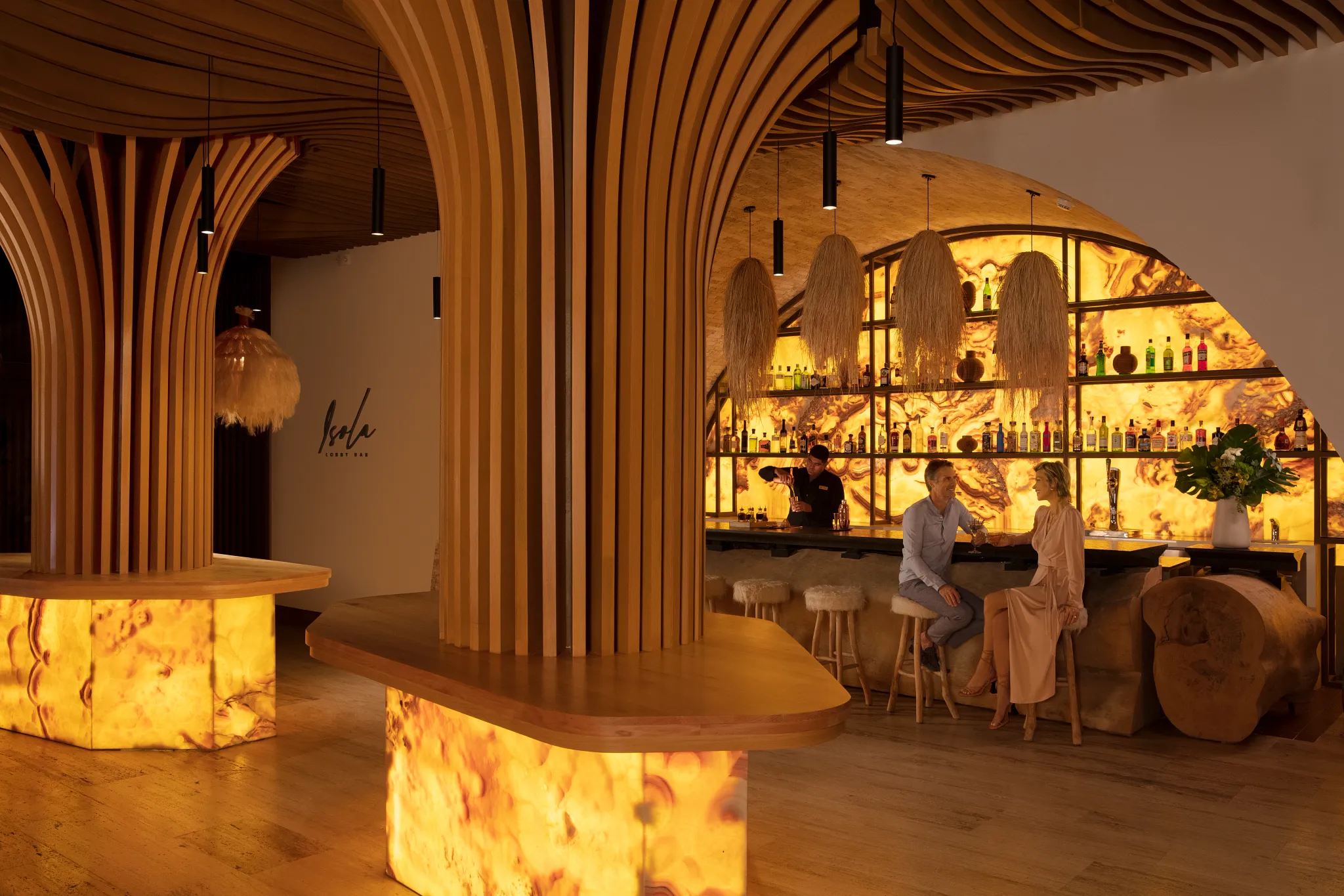 Isola restaurant at Impression Isla Mujeres by Secrets featuring elegant indoor-outdoor dining, modern coastal design, and scenic ocean views.
