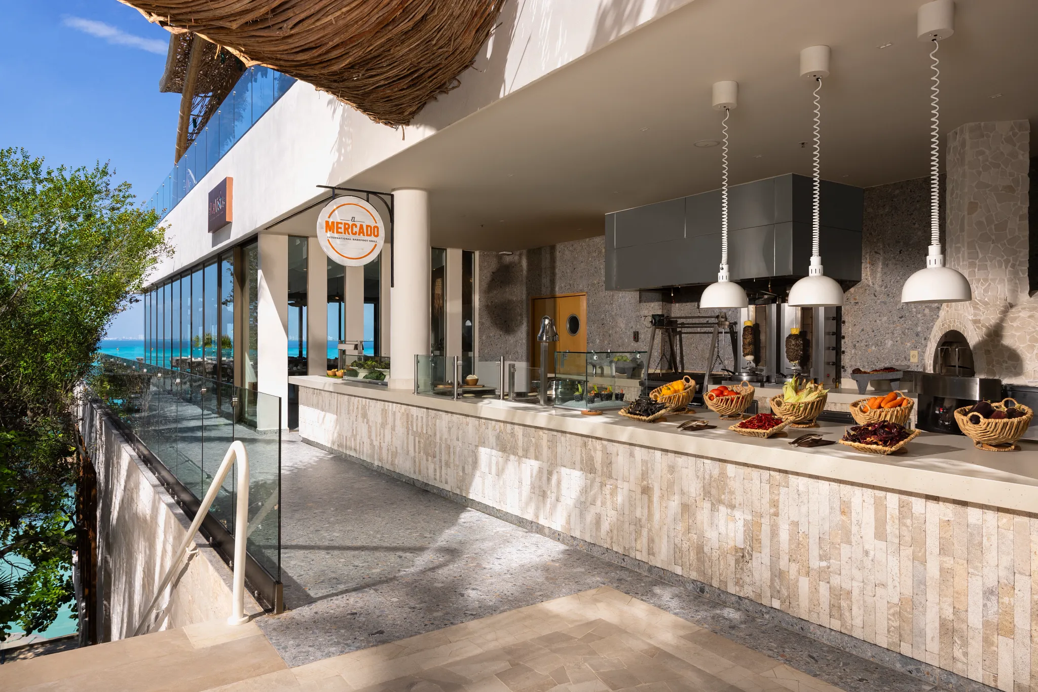 Mercado restaurant at Impression Isla Mujeres by Secrets featuring a vibrant market-style dining space with interactive food stations and modern design.