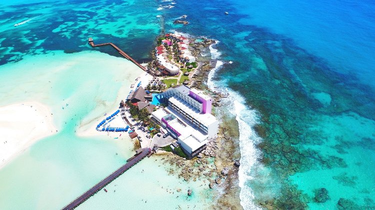 Na Balam Hotel Isla Mujeres boutique beachfront hotel with yoga retreat vibes, hammocks, and bohemian atmosphere on Playa Norte.