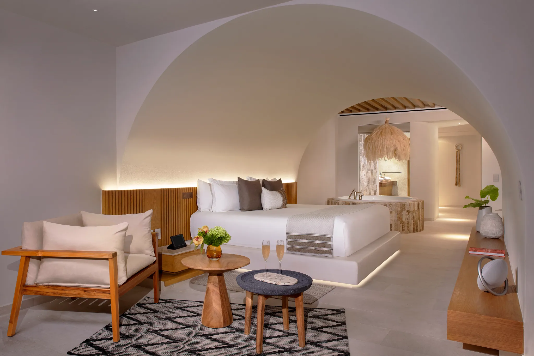 Presidential Suite bedroom with king bed and modern decor at Impression Isla Mujeres by Secrets.