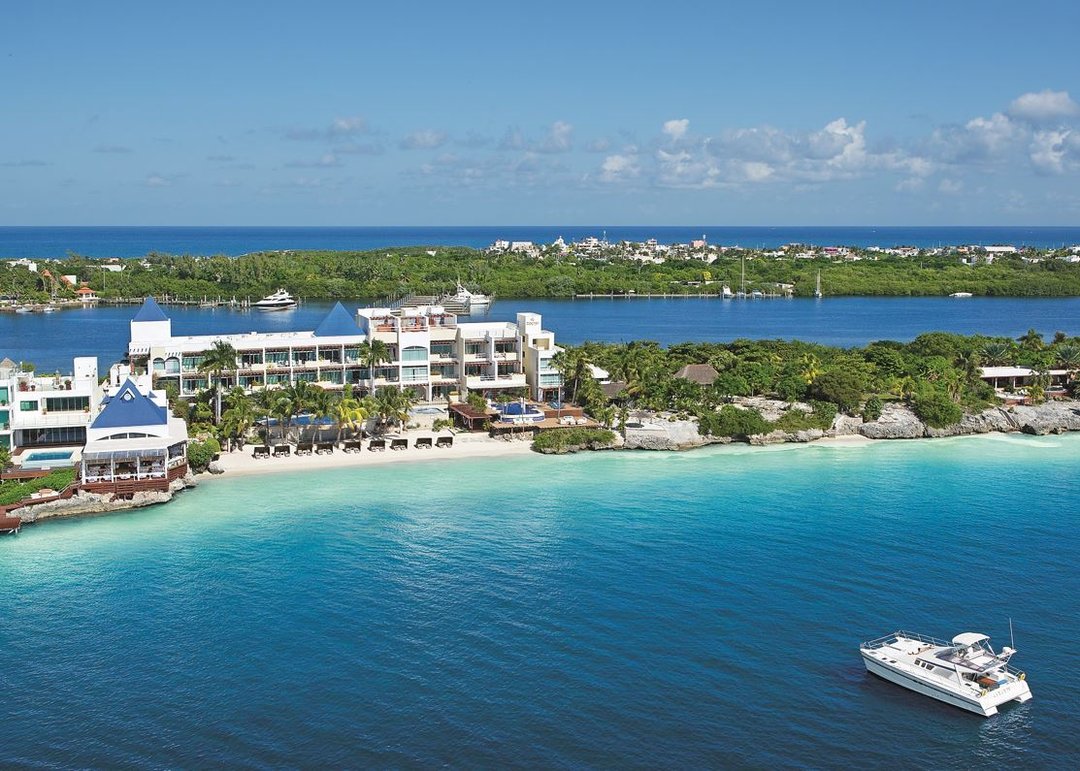 Zoetry Villa Rolandi Isla Mujeres luxury boutique resort with oceanfront suites and wellness-focused amenities.